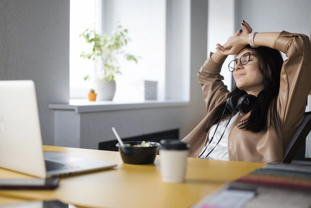 Person taking a break at the office to reduce stress